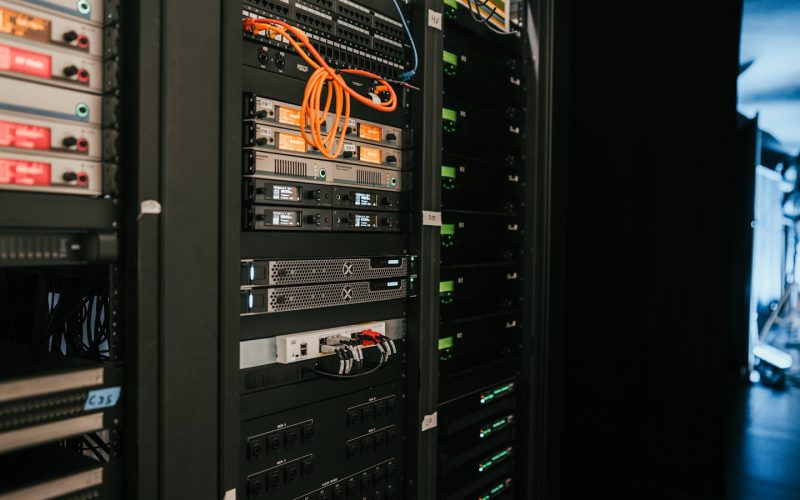 a rack of servers in a server room