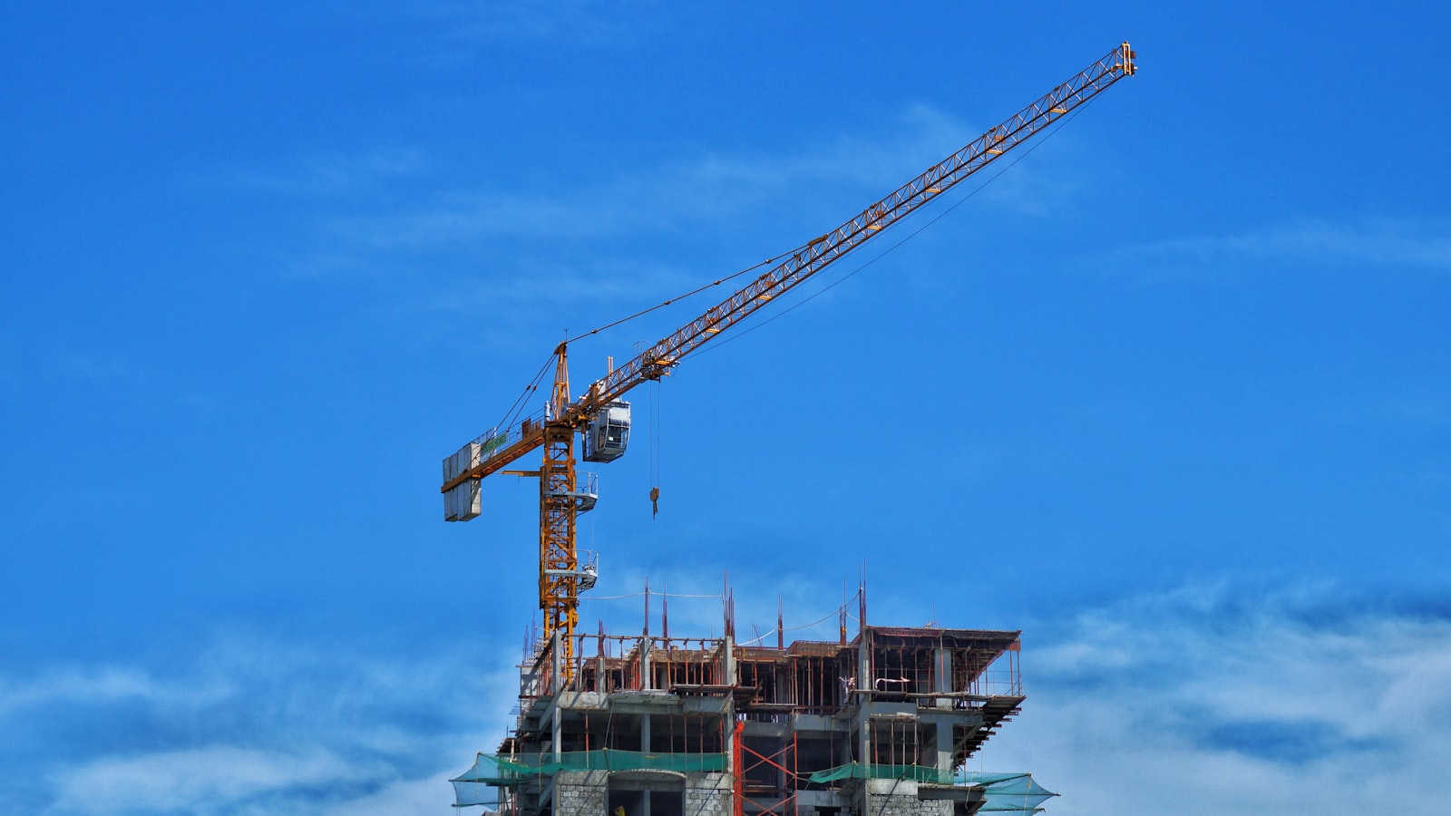 a crane lifting a building