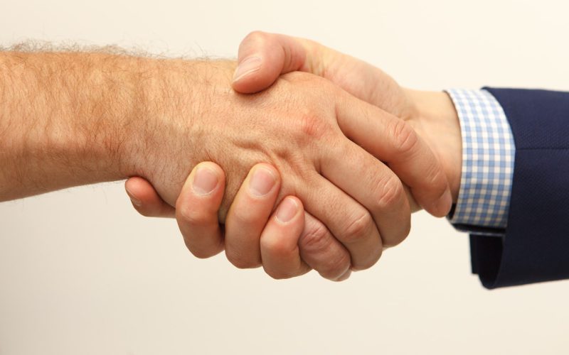 man and woman holding hands